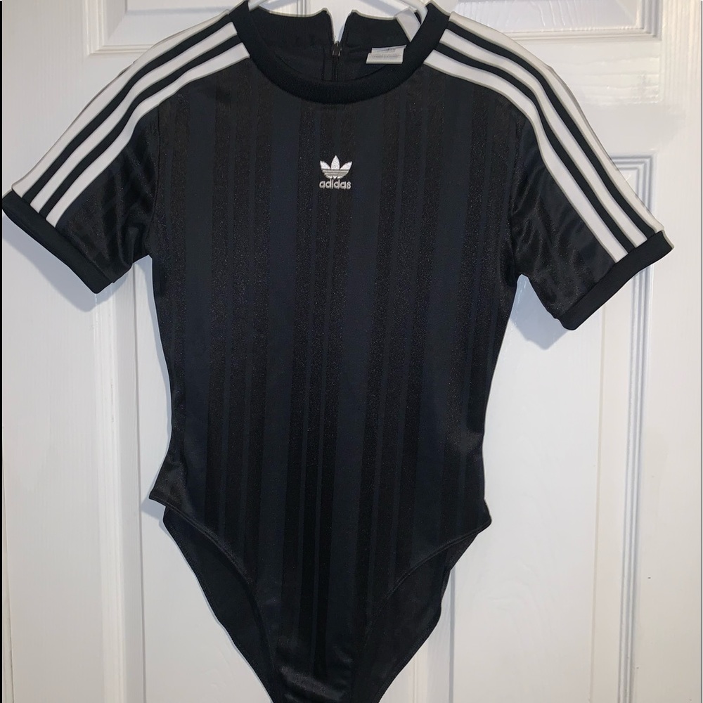 Soft leotard shirt size small. Dark Blue